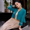 Teal cropped jacket with gota trim and beaded edging over the beige Chhabili skirt