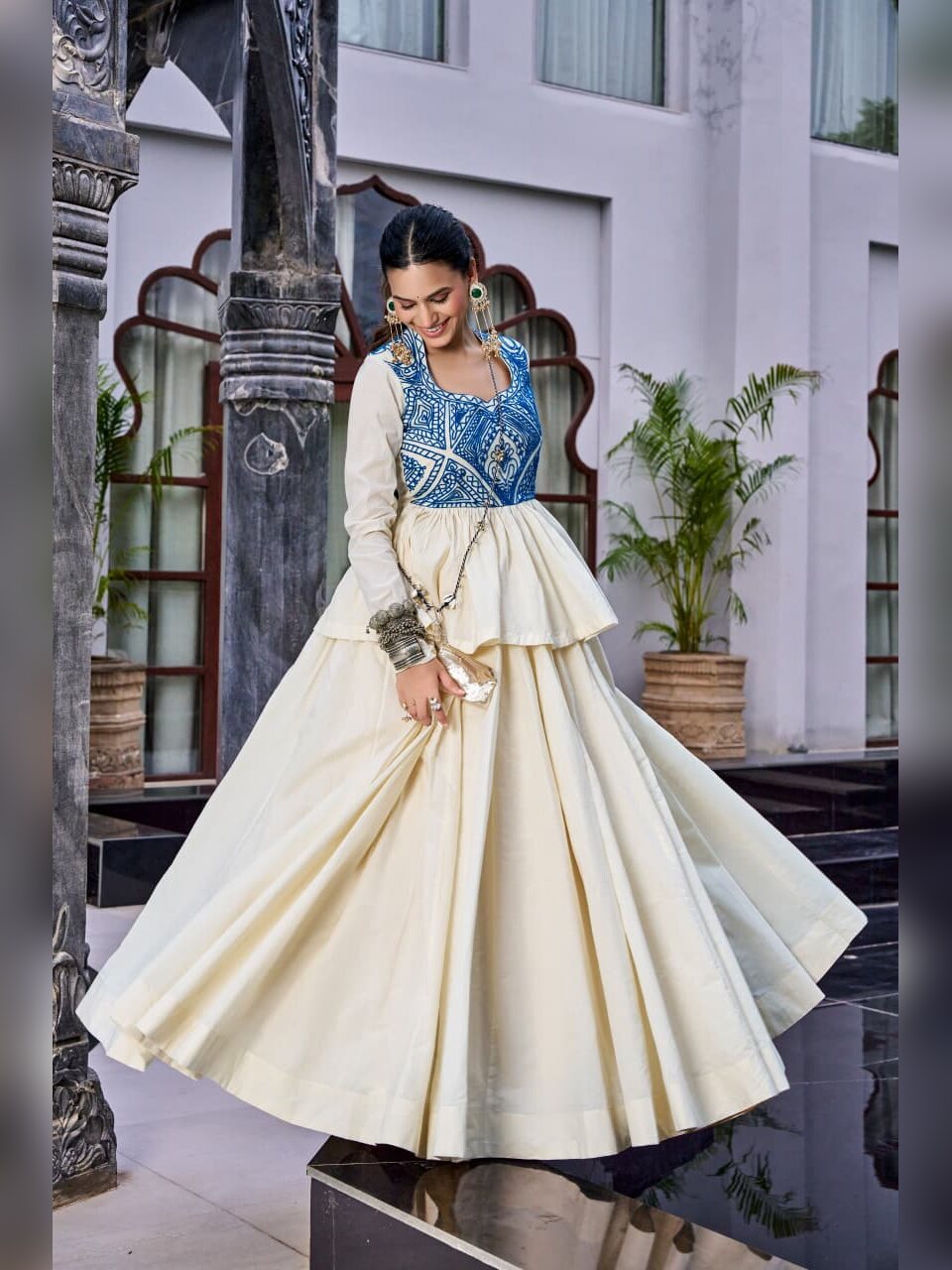 Off white pure cotton Navratri chaniya choli with blue Kashida work peplum top and matching purse