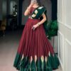 Maroon chinon Navratri chaniya choli with green georgette dupatta draped