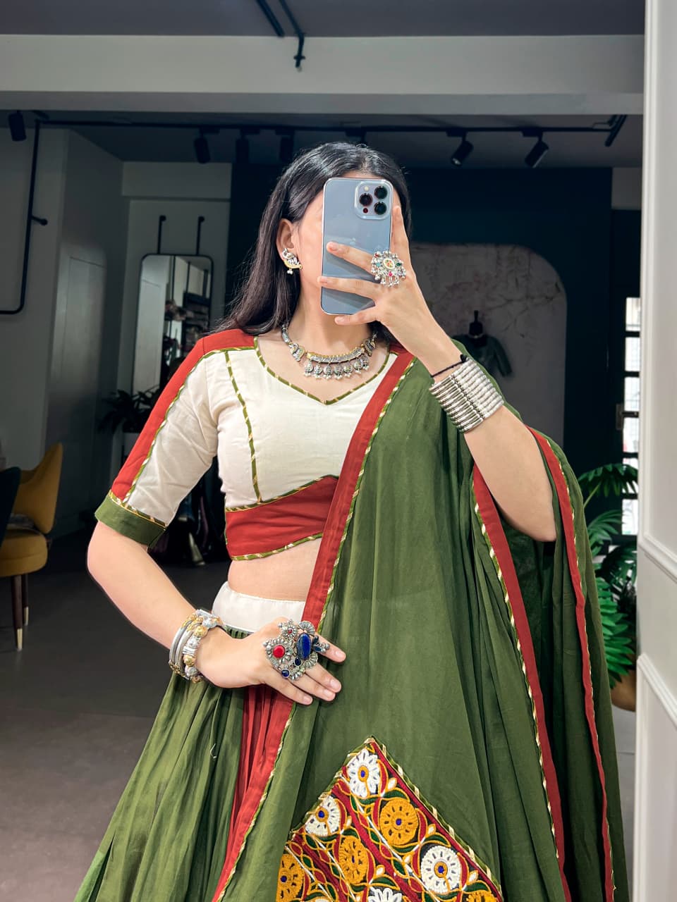 Close view of the gotta patti lace blouse and gamthi work on the green dupatta
