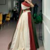 Back view of the mehendi green and off white panelled cotton lehenga
