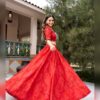 Red georgette lehenga with tonal leaf print opening on a turn